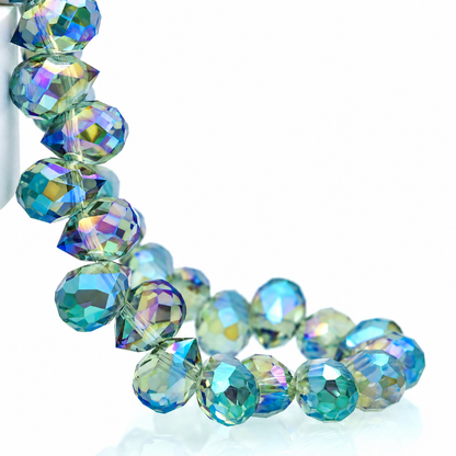Transparent Green faceted teardrop K9 glass bead strand