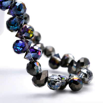 Fuchsia Gunmetal faceted teardrop K9 glass bead strand