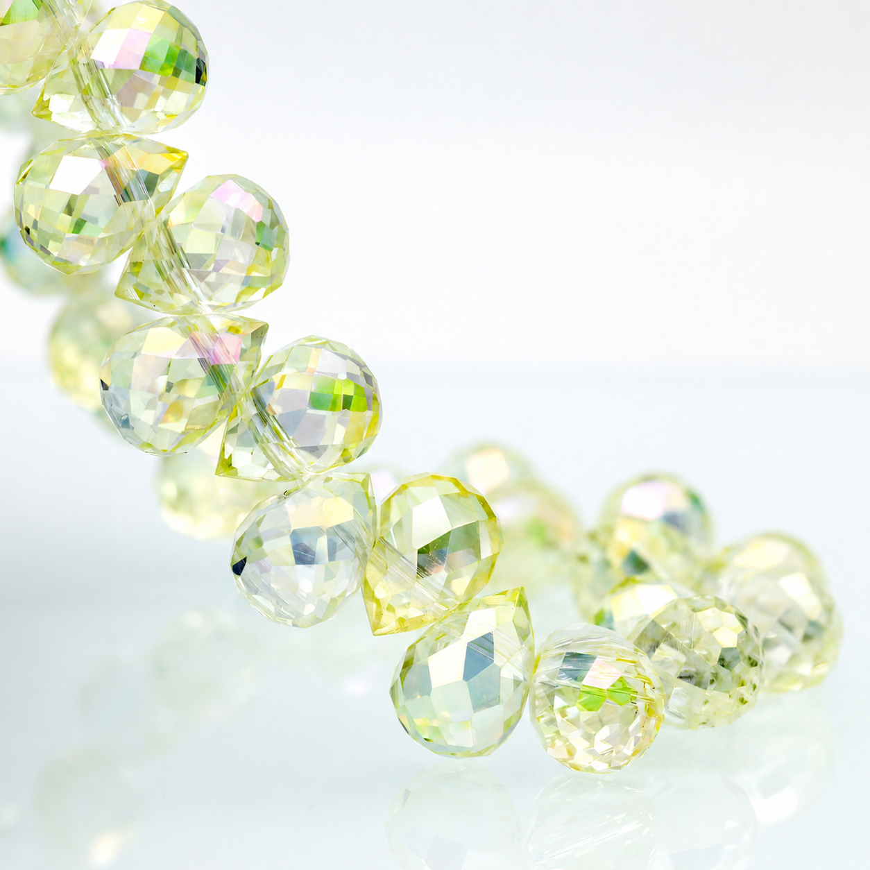 Crystal Yellow faceted teardrop K9 glass bead strand