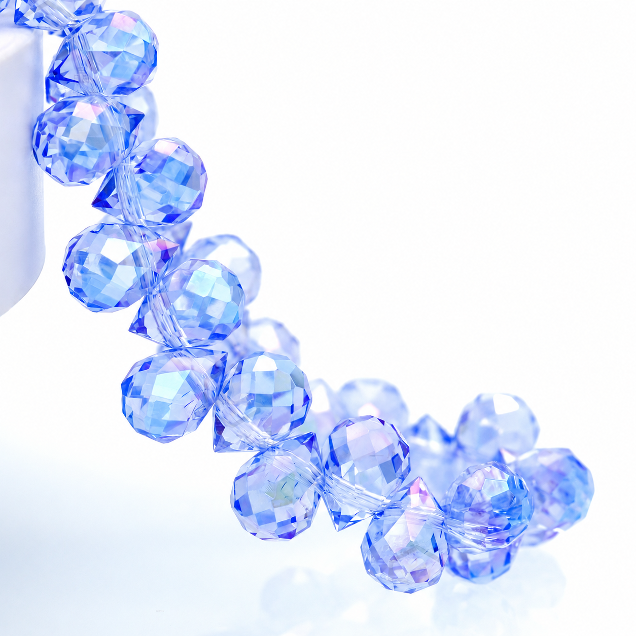 Soft Blue AB faceted teardrop K9 glass bead strand