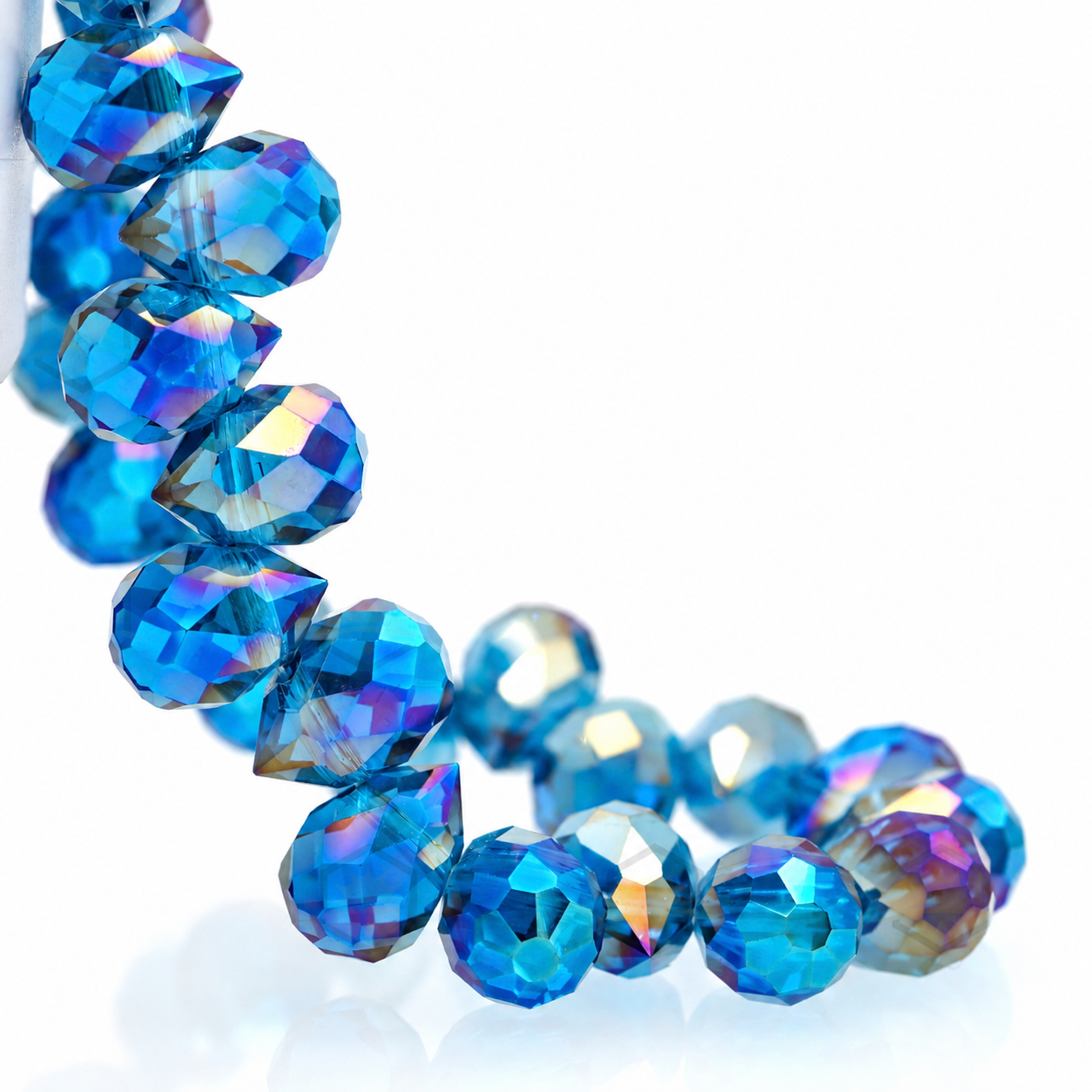 Peacock Blue AB faceted teardrop K9 glass bead strand