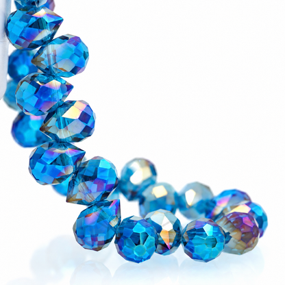 Peacock Blue AB faceted teardrop K9 glass bead strand