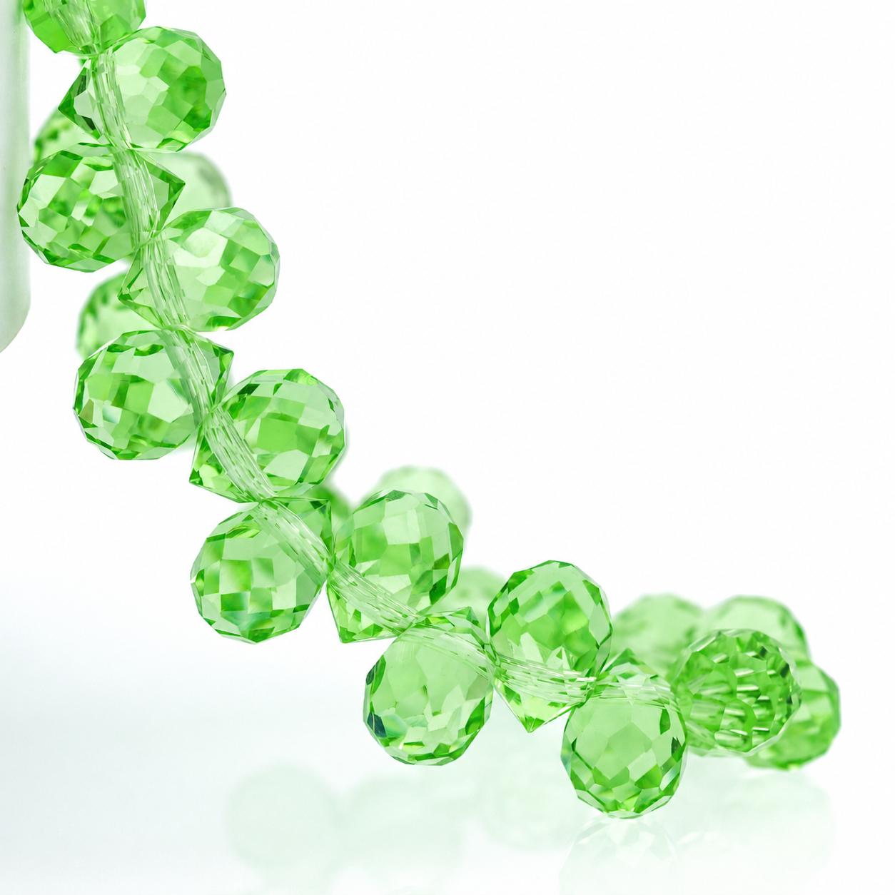 Fruit Green faceted teardrop K9 glass bead strand