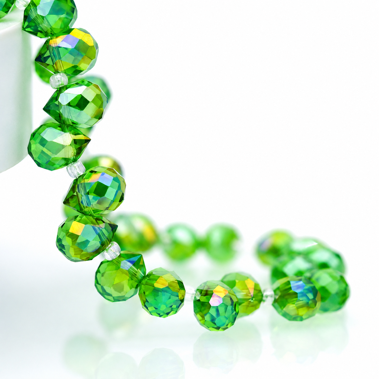 Grass Green AB faceted teardrop K9 glass bead strand
