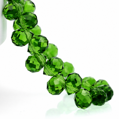 Deep Green faceted teardrop K9 glass bead strand
