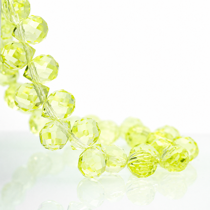 Lemon Yellow faceted teardrop K9 glass bead strand