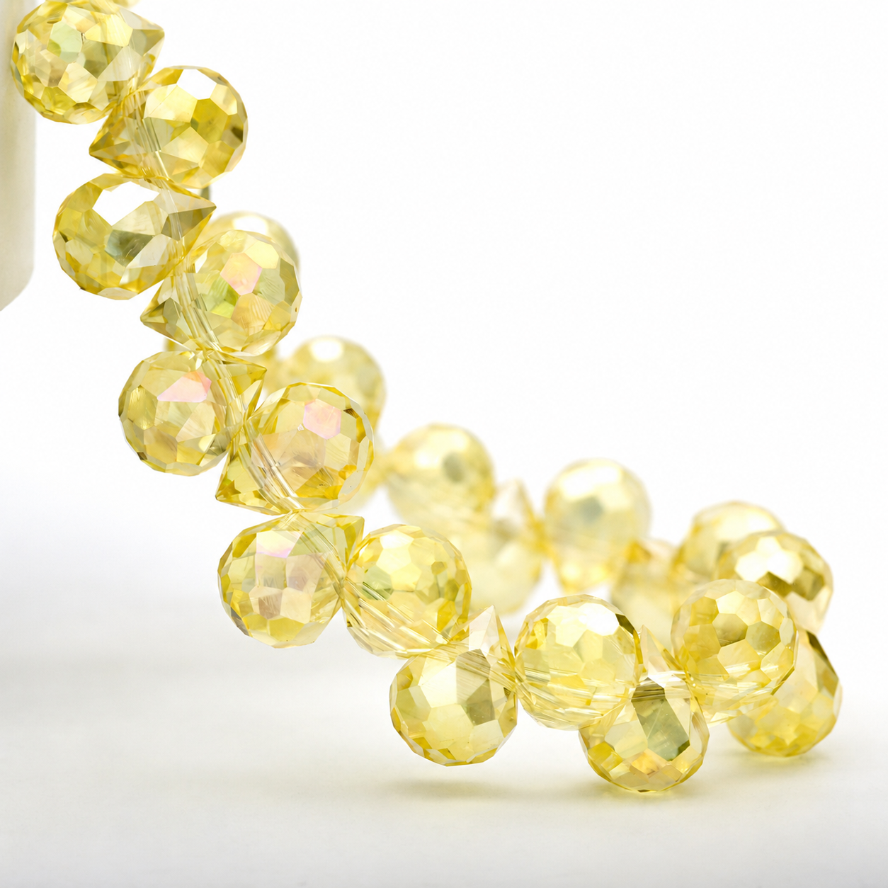 Light Yellow AB faceted teardrop K9 glass bead strand
