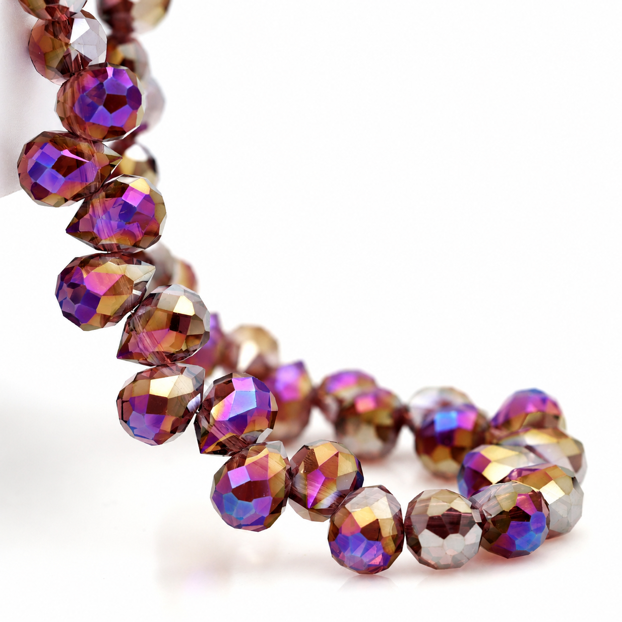 Medium Purple AB faceted teardrop K9 glass bead strand