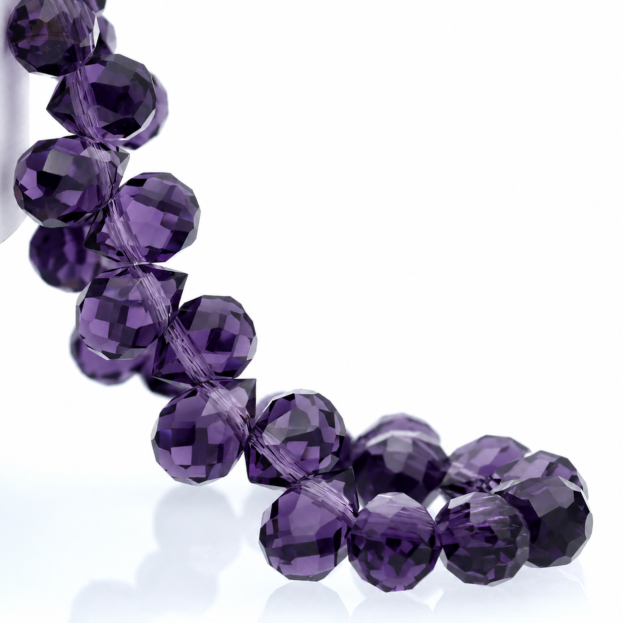 Violet faceted teardrop K9 glass bead strand
