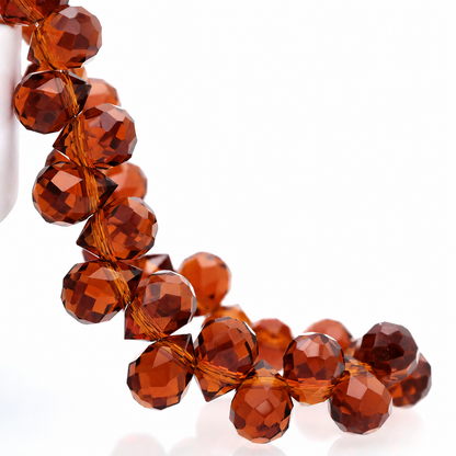 Deep Tiger Eye faceted teardrop K9 glass bead strand