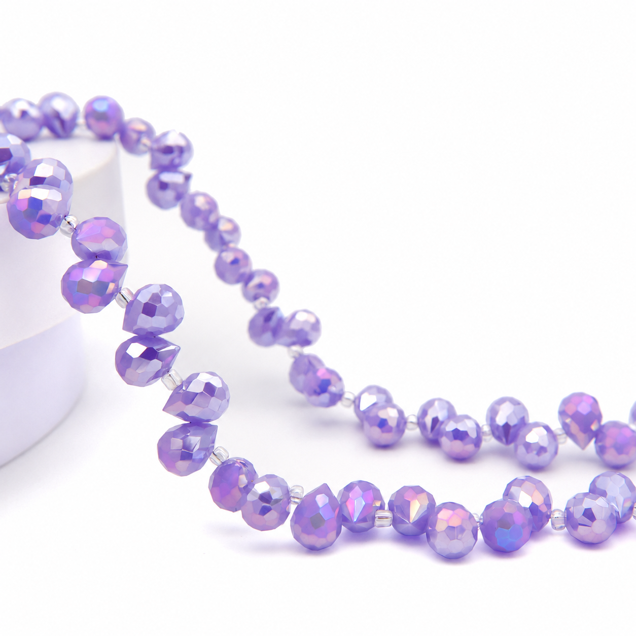 Crystal Purple Jade AB faceted teardrop K9 glass bead strand
