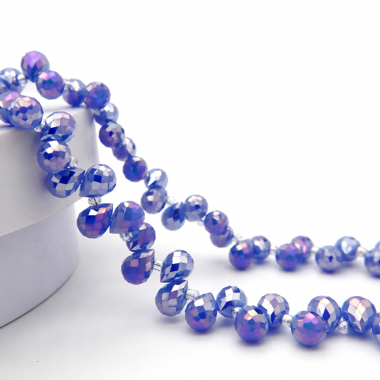 Light Blue Jade AB faceted teardrop K9 glass bead strand
