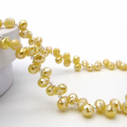 Yellow Jade AB faceted teardrop K9 glass bead strand
