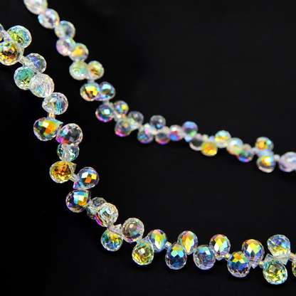 Aurora AB faceted teardrop K9 glass bead strand