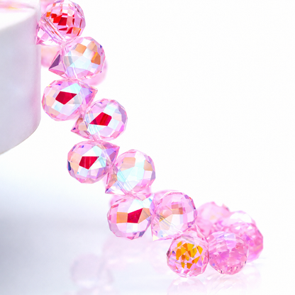 Pink Heavenly Light faceted teardrop K9 glass bead strand