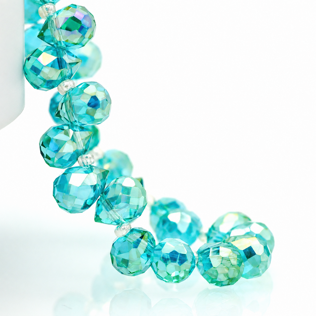 Ocean Blue AB faceted teardrop K9 glass bead strand