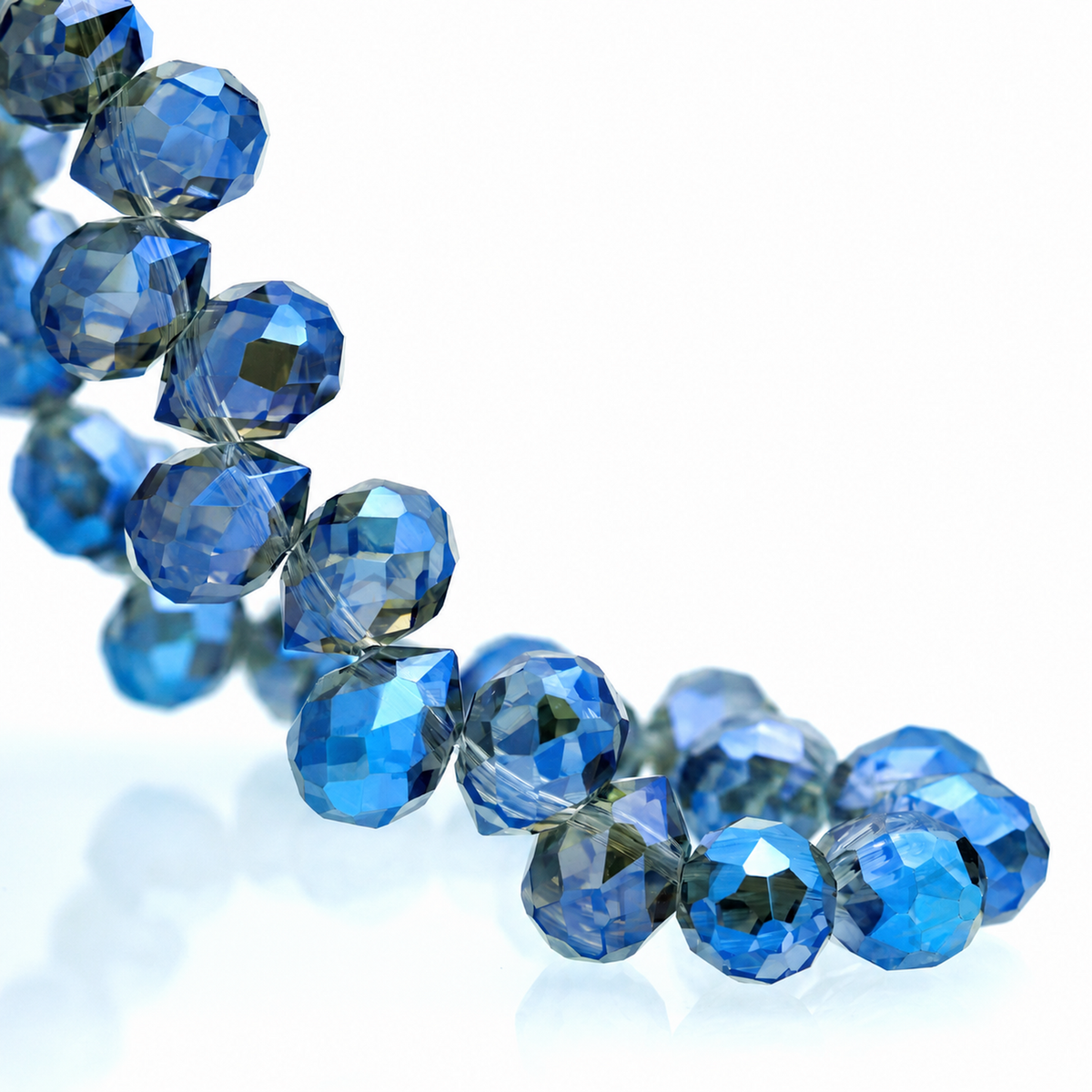 Metallic Ink Blue faceted teardrop K9 glass bead strand