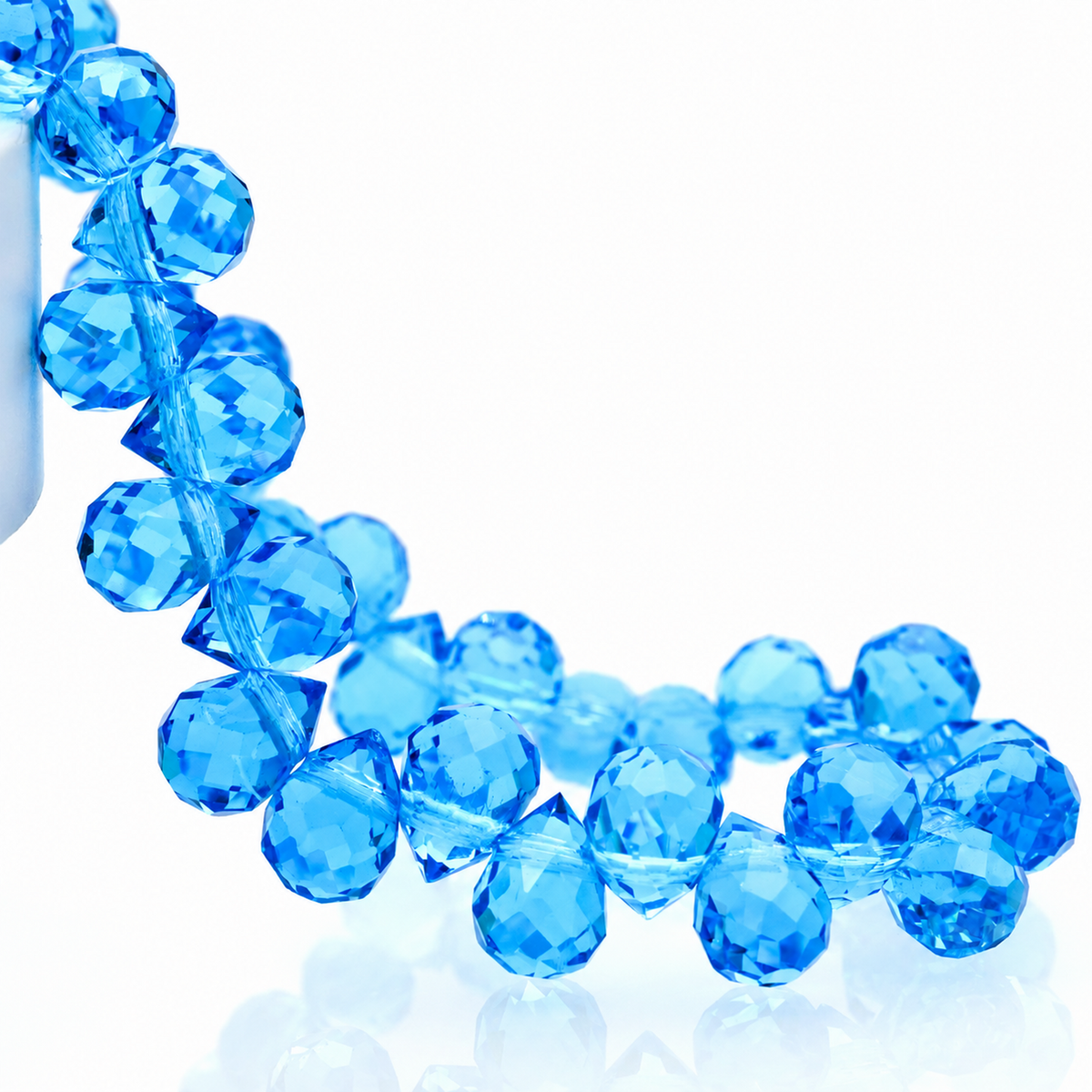 Lake Blue faceted teardrop K9 glass bead strand