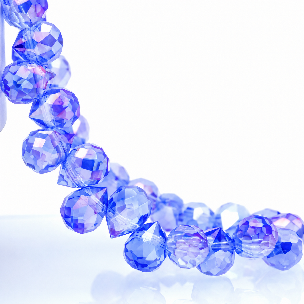 Light Blue AB faceted teardrop K9 glass bead strand