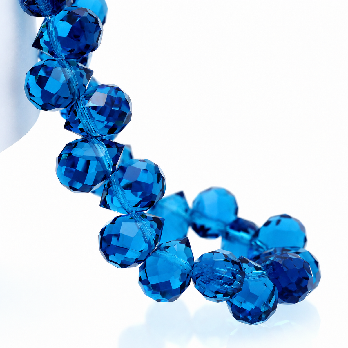 Peacock Blue faceted teardrop K9 glass bead strand