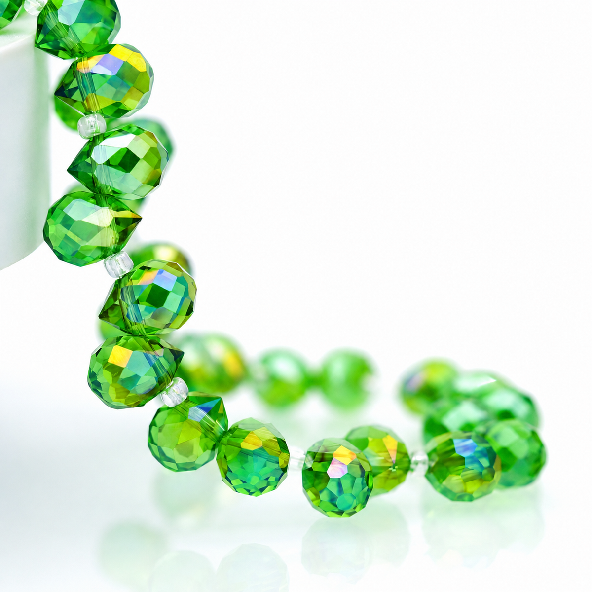 Grass Green AB faceted teardrop K9 glass bead strand