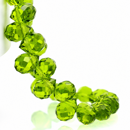 Olive Green faceted teardrop K9 glass bead strand