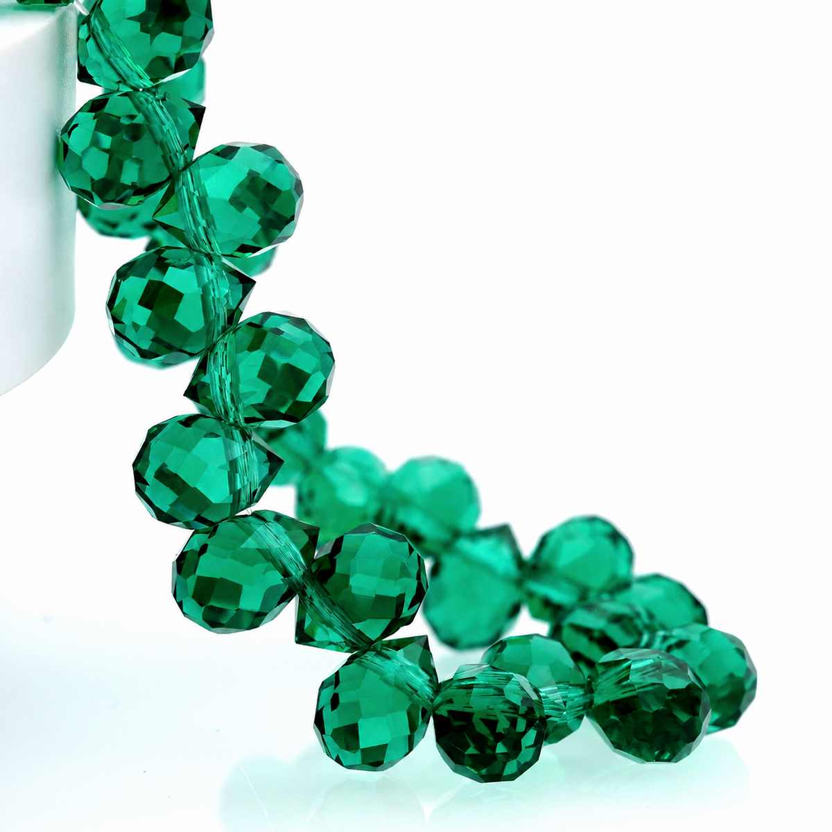 Peacock Green faceted teardrop K9 glass bead strand