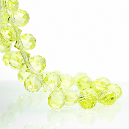 Lemon Yellow faceted teardrop K9 glass bead strand