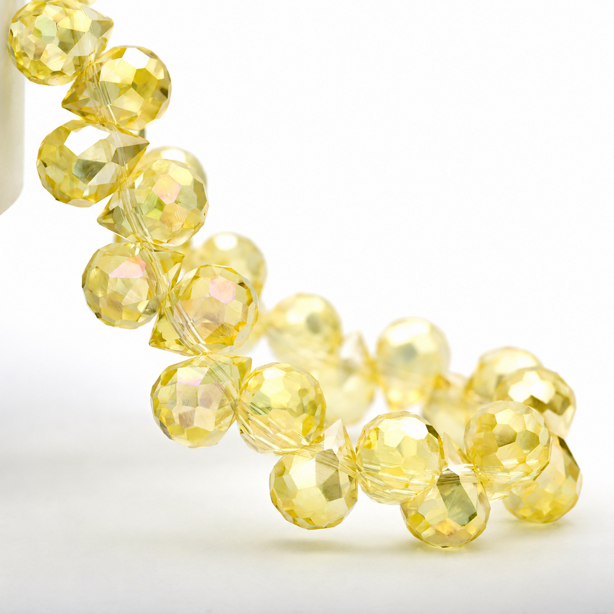 Light Yellow AB faceted teardrop K9 glass bead strand