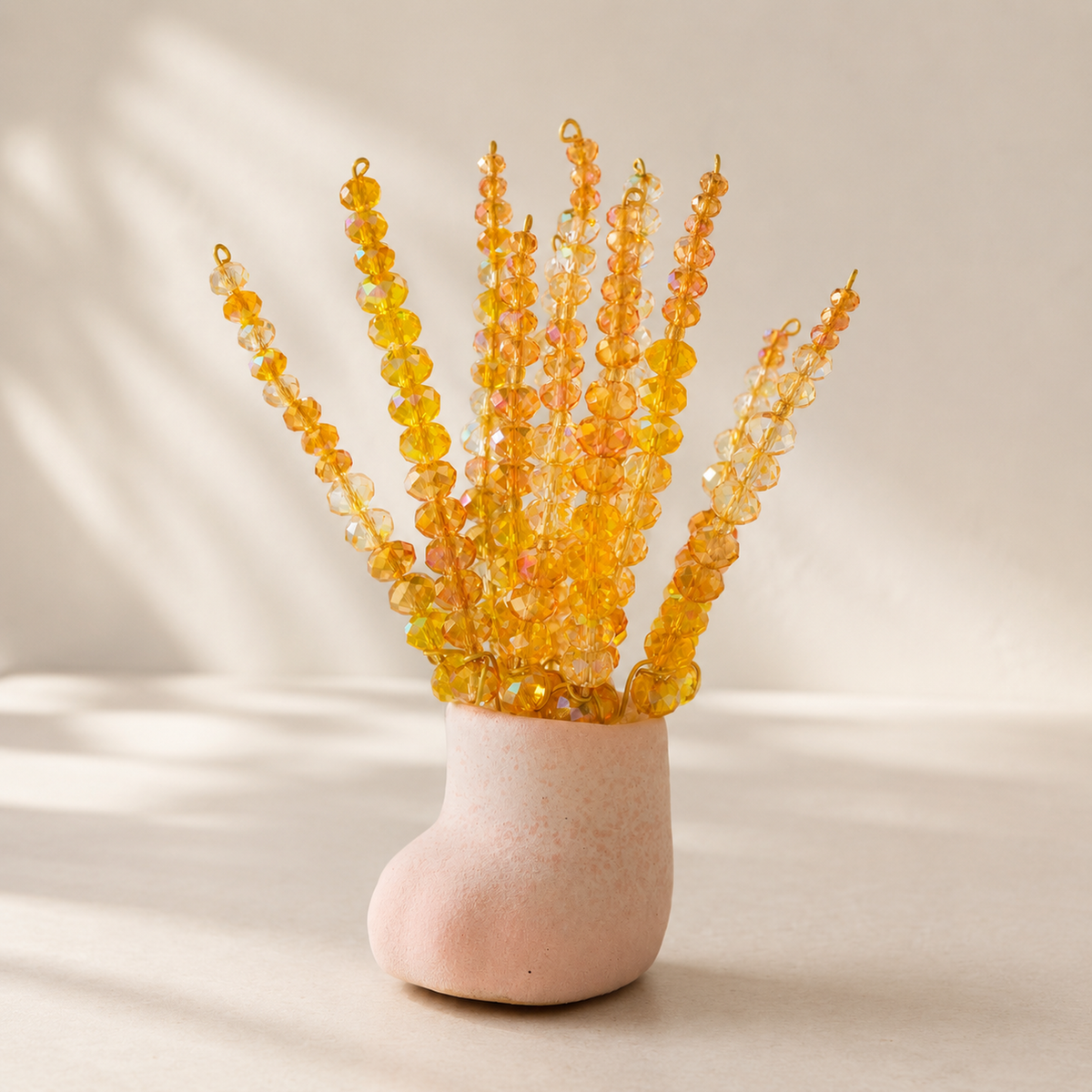 Golden harvest wheat beaded plant in a pink mini cat paw pot