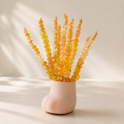 Golden harvest wheat beaded plant in a pink mini cat paw pot