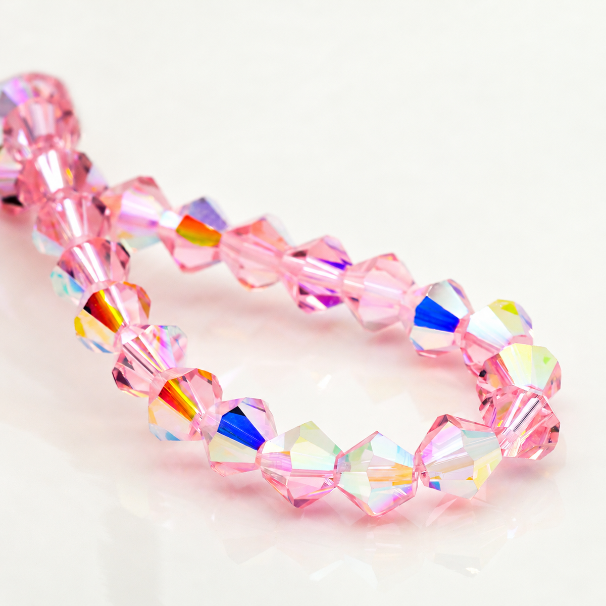 K9 faceted crystal glass bicone beads – Rose Pink Aurora
