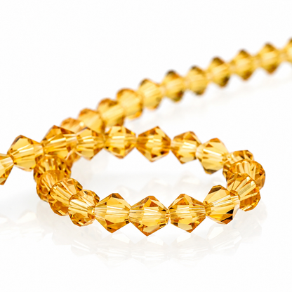 K9 faceted crystal glass bicone beads – Golden Champagne