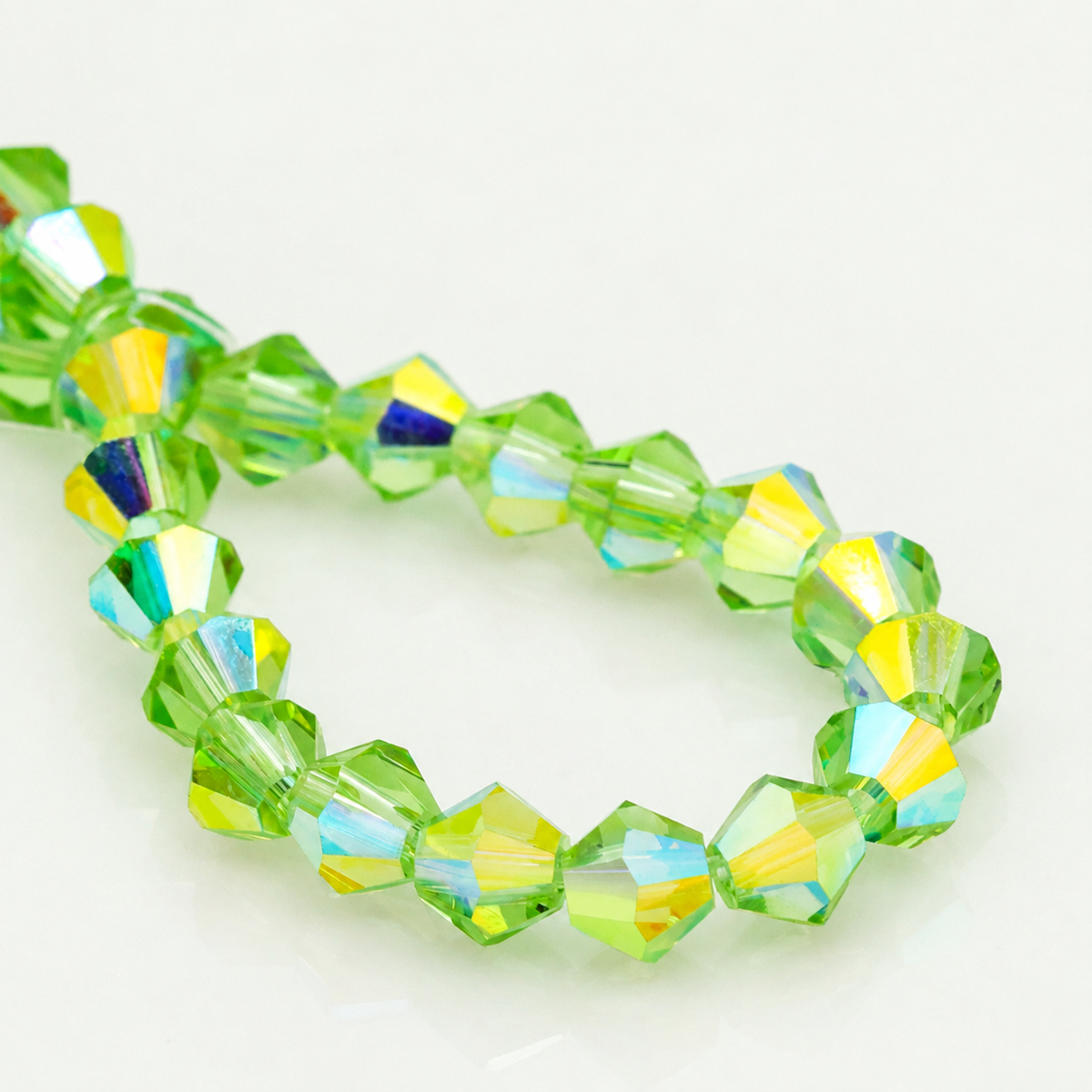 K9 faceted crystal glass bicone beads – Apple Green Aurora