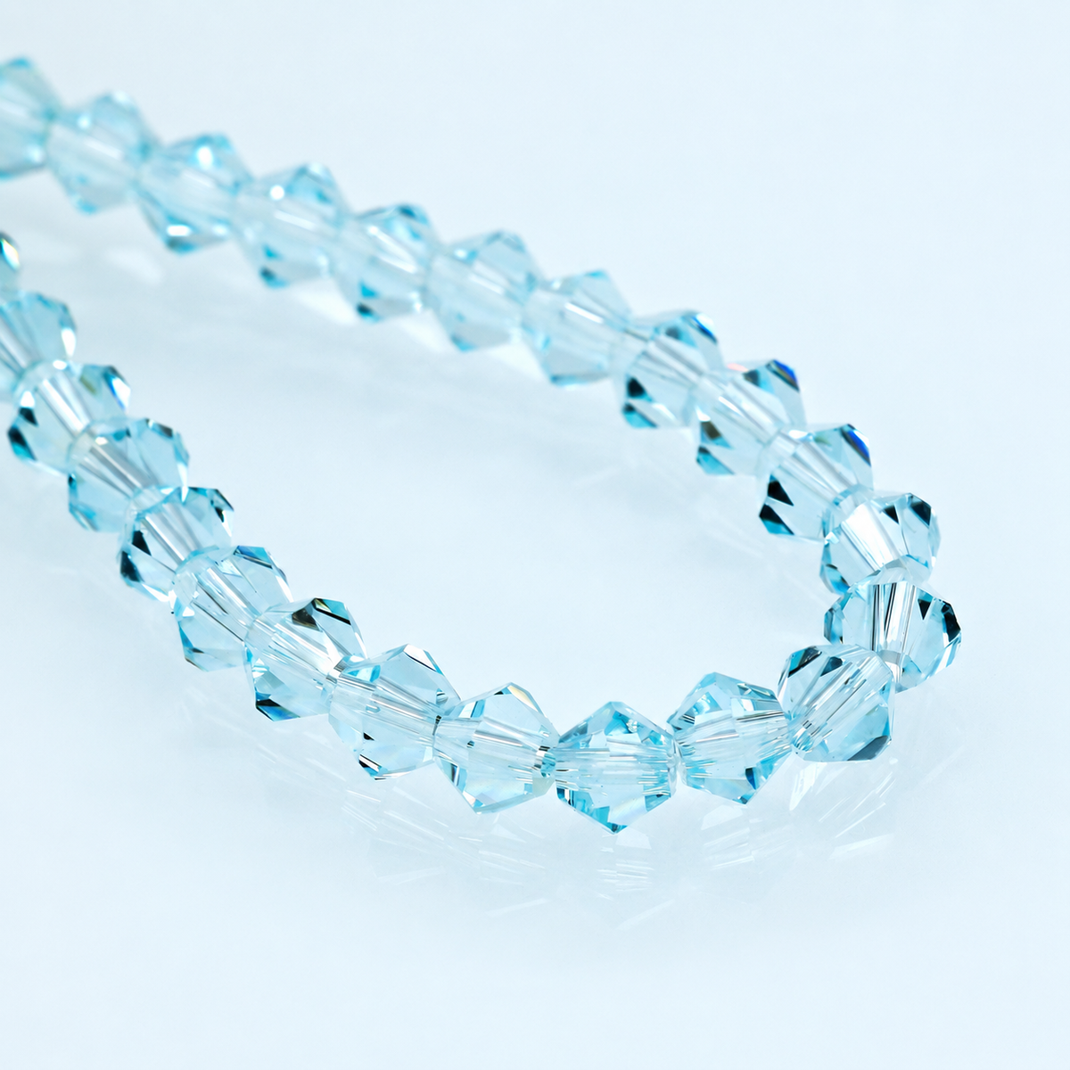 K9 faceted crystal glass bicone beads – Ice Blue