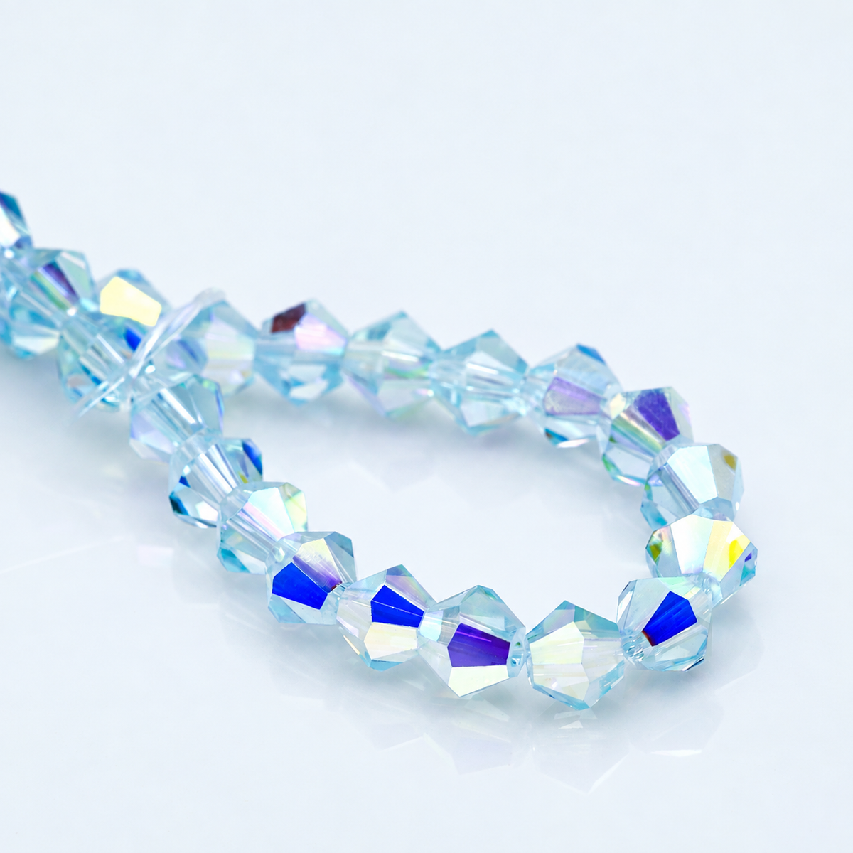 K9 faceted crystal glass bicone beads – Ice Blue Aurora