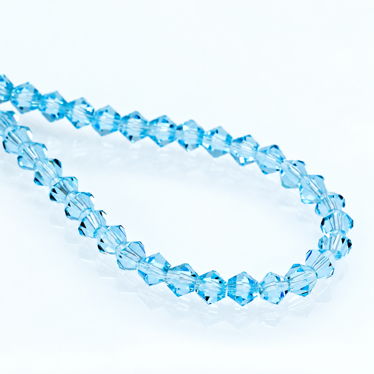 K9 faceted crystal glass bicone beads – Light Lake Blue