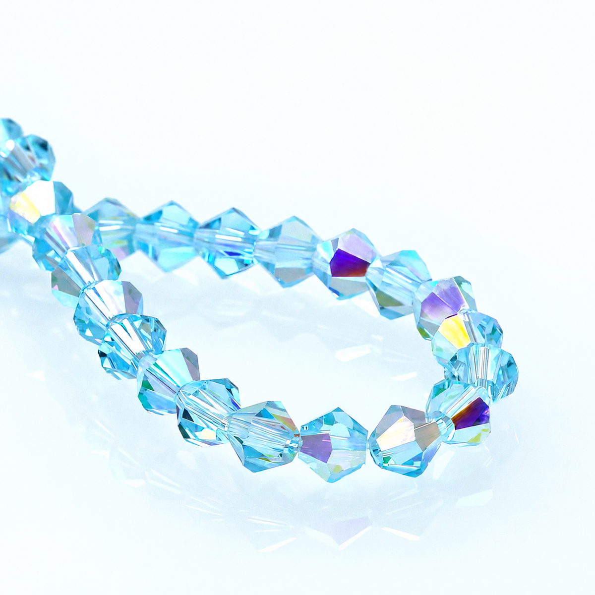 K9 faceted crystal glass bicone beads – Light Lake Blue Aurora