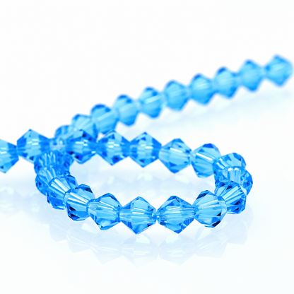 K9 faceted crystal glass bicone beads – Lake Blue