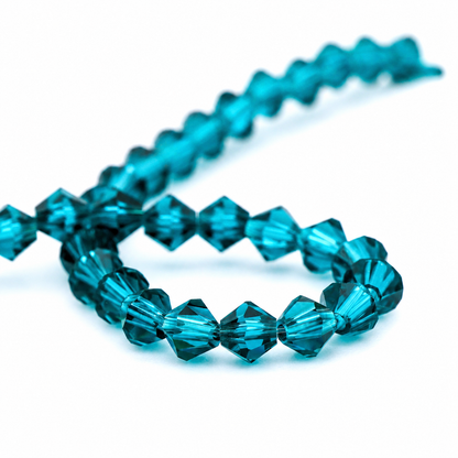 K9 faceted crystal glass bicone beads – Peacock Blue