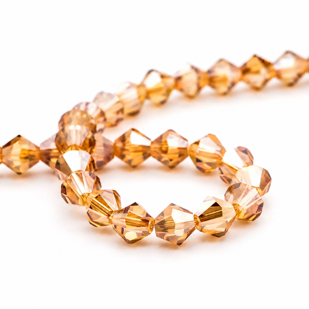 K9 faceted crystal glass bicone beads – Amber Gold