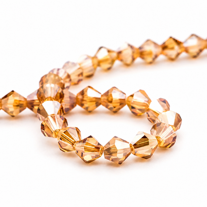 K9 faceted crystal glass bicone beads – Amber Gold