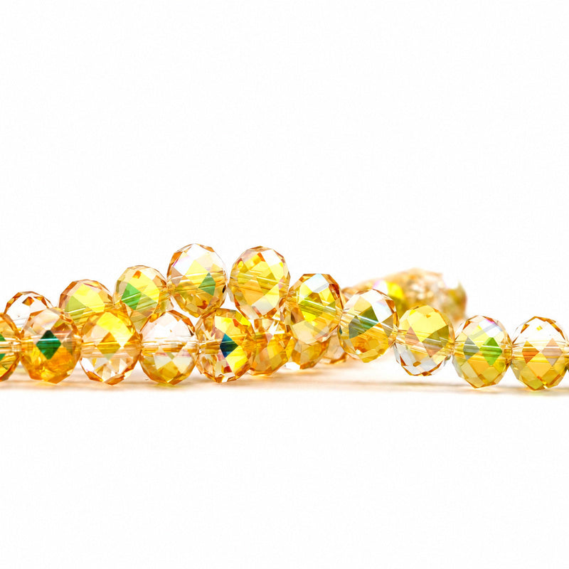 K9 faceted crystal glass rondelle beads in Bright Gold - sold by the strand