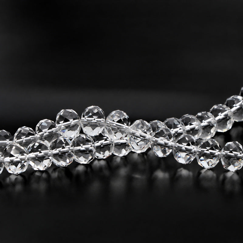 K9 faceted crystal glass rondelle beads in Crystal Clear - sold by the strand