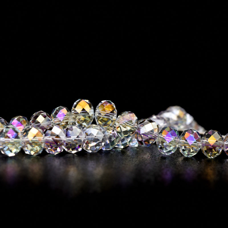 K9 faceted crystal glass rondelle beads in Crystal Clear AB - sold by the strand