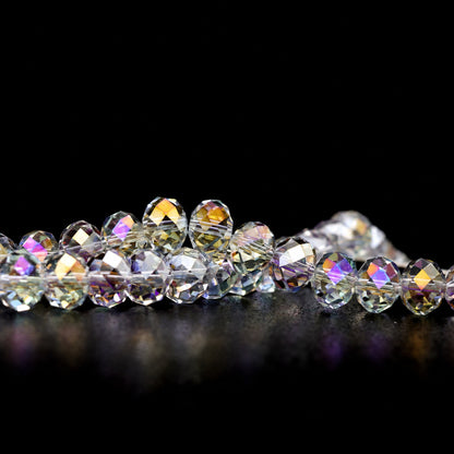 K9 faceted crystal glass rondelle beads in Crystal Clear AB - sold by the strand