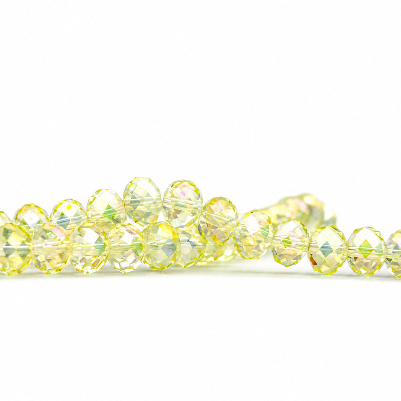 K9 faceted crystal glass rondelle beads in Crystal Yellow - sold by the strand