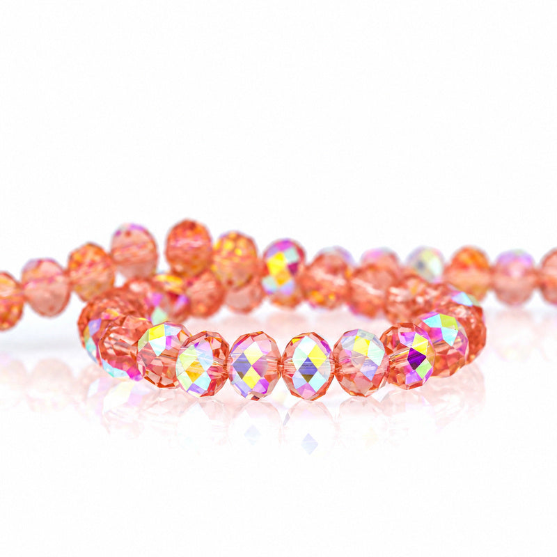 K9 faceted crystal glass rondelle beads in Grapefruit Red Aurora - sold by the strand