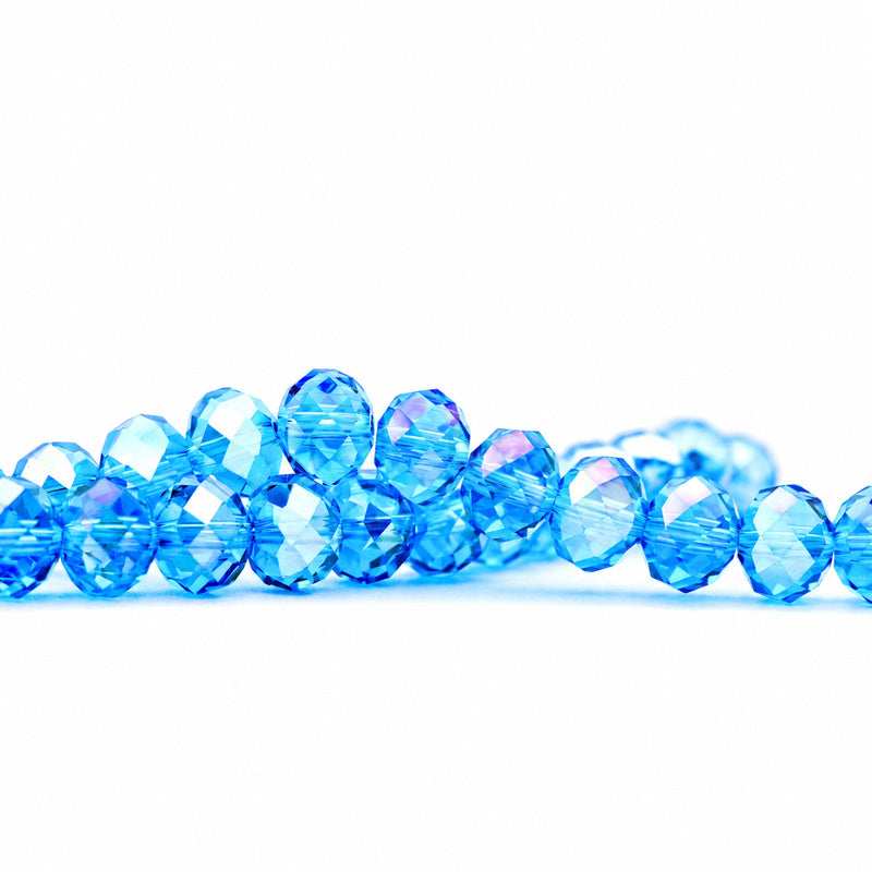 K9 faceted crystal glass rondelle beads in Lake Blue AB - sold by the strand