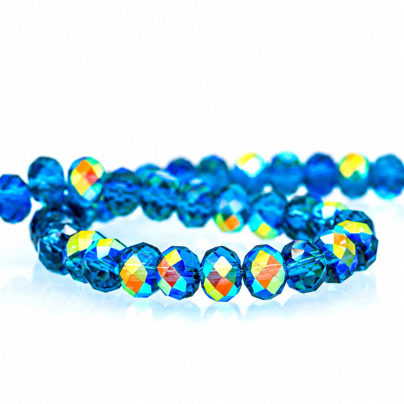 K9 faceted crystal glass rondelle beads in Peacock Blue Aurora - sold by the strand